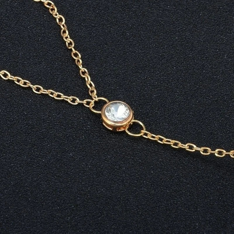 Elegantes Gold-Armband mit Zirkonia und Ring